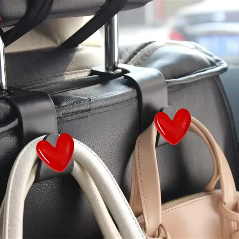 Gancio per poggiatesta per seggiolino auto 3D Love carino da 2 pezzi - Organizzatore universale per riporre veicoli per borse, portafogli e giacche