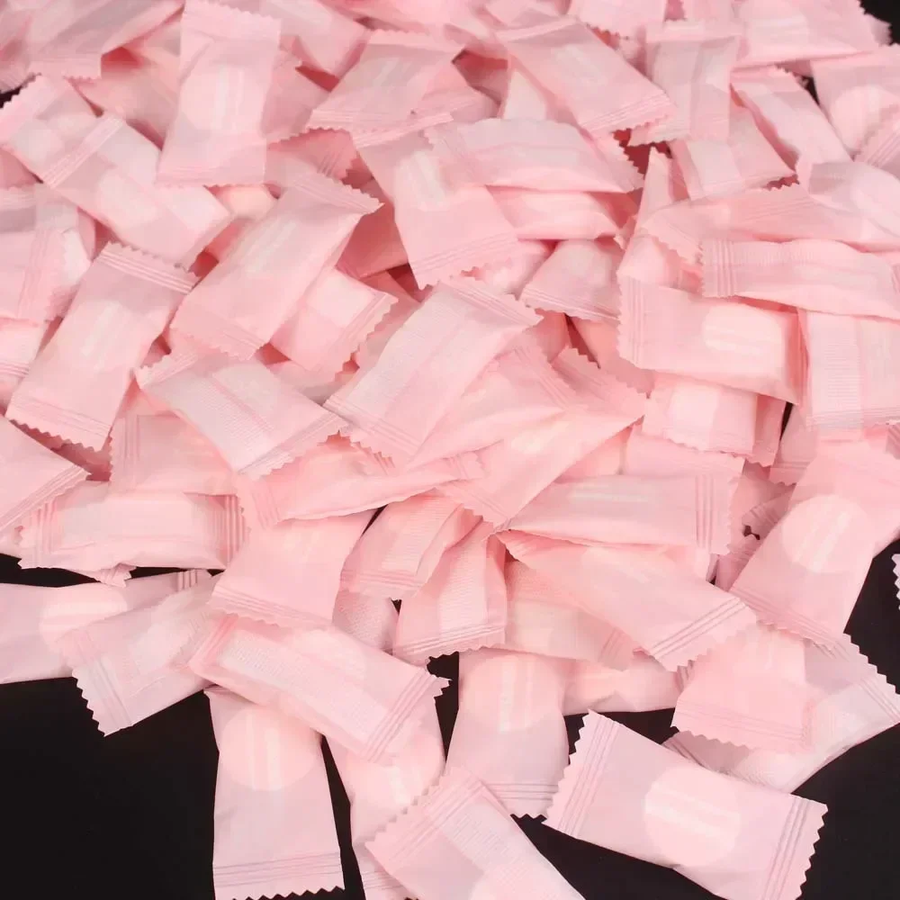 100PCS Mini Asciugamano Compresso Capsule Usa E Getta Asciugamano Magico Cura del Viso Tablet Salviette di Stoffa Da Viaggio All'aperto Tessuto di Carta